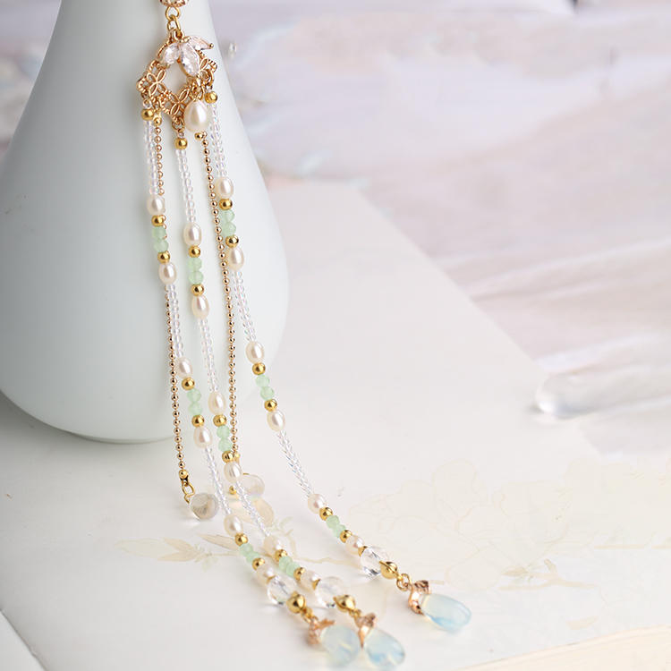 elegant gold-toned hanfu ancient style dangling earring featuring a delicate floral top piece with clear crystals, cascading strands of white pearls, light green jade beads, and soft blue teardrop-shaped stones, perfect for ancient style handmade or style handmade hair adornment.