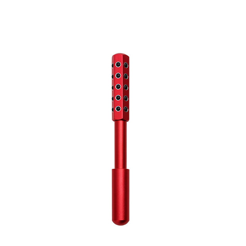 red metallic germanium beauty roller massage stick with a cylindrical head featuring evenly spaced circular indentations for facial massage.