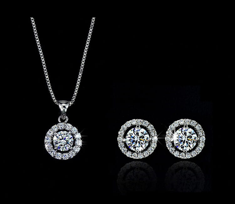 silver-toned diamond halo necklace and matching stud earrings jewelry sets designed for luxury women’s fashion.
