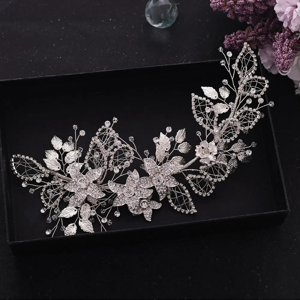 Handmade environmentally friendly silver floral headpiece featuring intricate wirework, sparkling rhinestones, and delicate leaf details crafted from environmentally friendly alloy for elegant friendly alloy hair styling.
