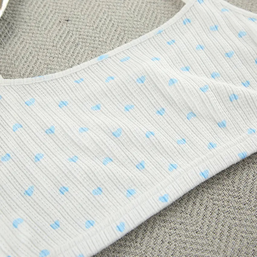 white ribbed camisole with light blue heart shaped polka dots featuring knitted heart printing as part of a comfortable loungewear set