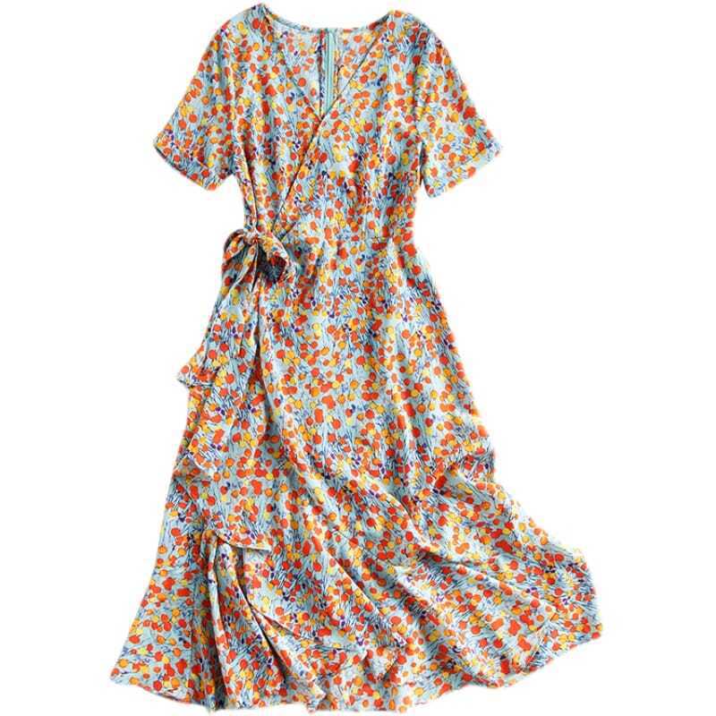 a flowing short-sleeved french floral slim wrap dress featuring a vibrant floral slim pattern of orange and yellow blossoms on a light blue background