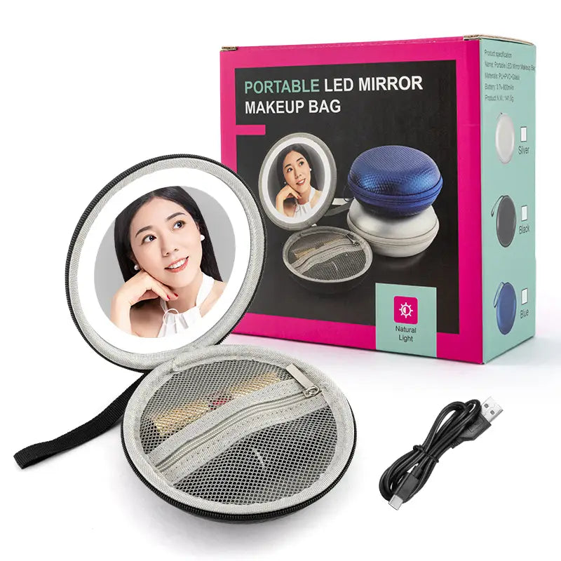 silver circular portable led mirror with usb charging cable and mesh-lined carrying case in a round bag blue design