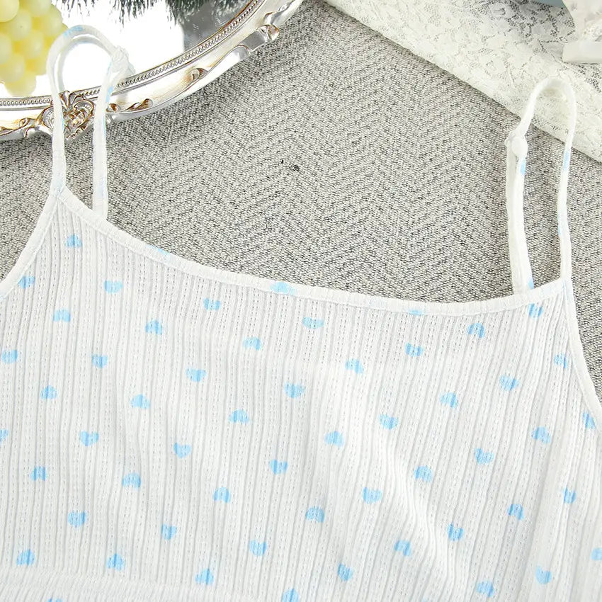 white camisole with delicate blue polka dots and thin spaghetti straps from knitted heart printing ribbed loungewear set offering heart printing comfortable style