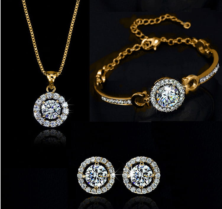 gold-toned jewelry sets featuring a necklace bracelet and earrings adorned with sparkling clear stones in circular halo designs for luxury women’s fashion.