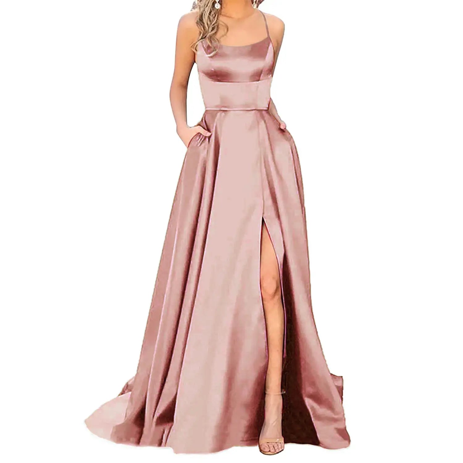 a solid color long sliming rose gold satin evening gown with a square neckline thin straps and a high slit