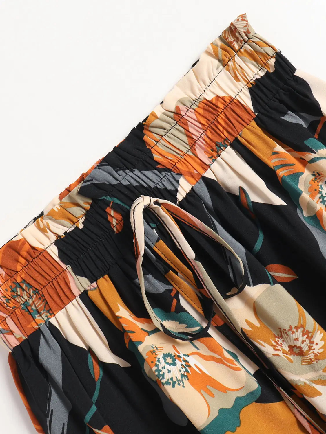 black orange and teal floral print drawstring pants with elastic waistband featuring a floral print elastic waist suitable for casual wear