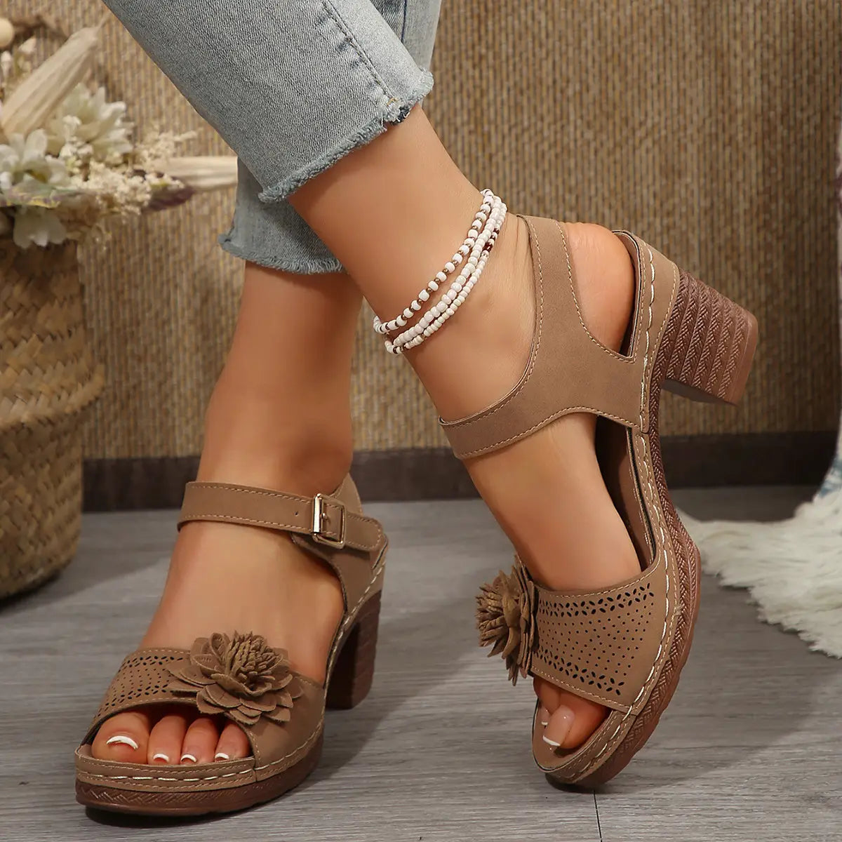 Beige floral flowers chunky heel sandals in tan leather with floral embellishment and perforated detailing perfect for heel sandals summer wear.