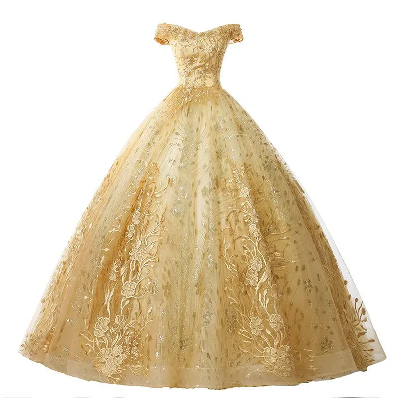 A shimmering gold off-the-shoulder solo performance costume featuring intricate floral embroidery and a voluminous tulle performance costume tutu skirt.