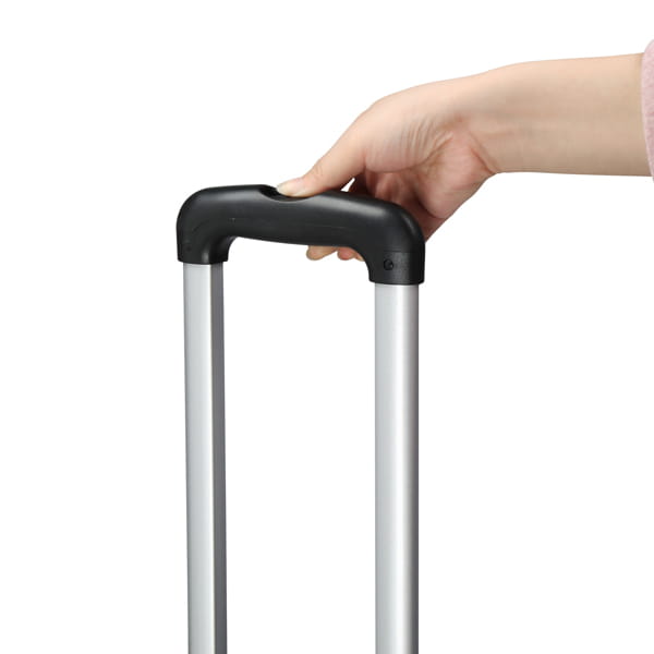 silver telescoping suitcase handle with black ergonomic grip attached to the yellow high pressure cleaning machine with hose reel for pressure cleaning tasks