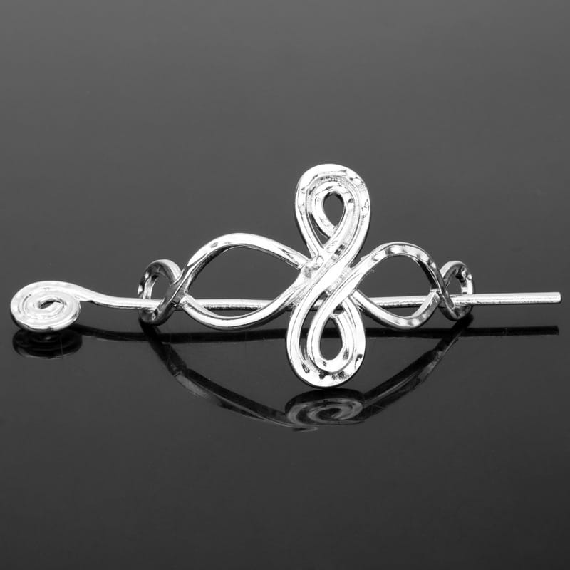 Silver Celtic knot metal hair clip featuring a silver filigree hairpin with an intricate swirling design and polished metallic finish.