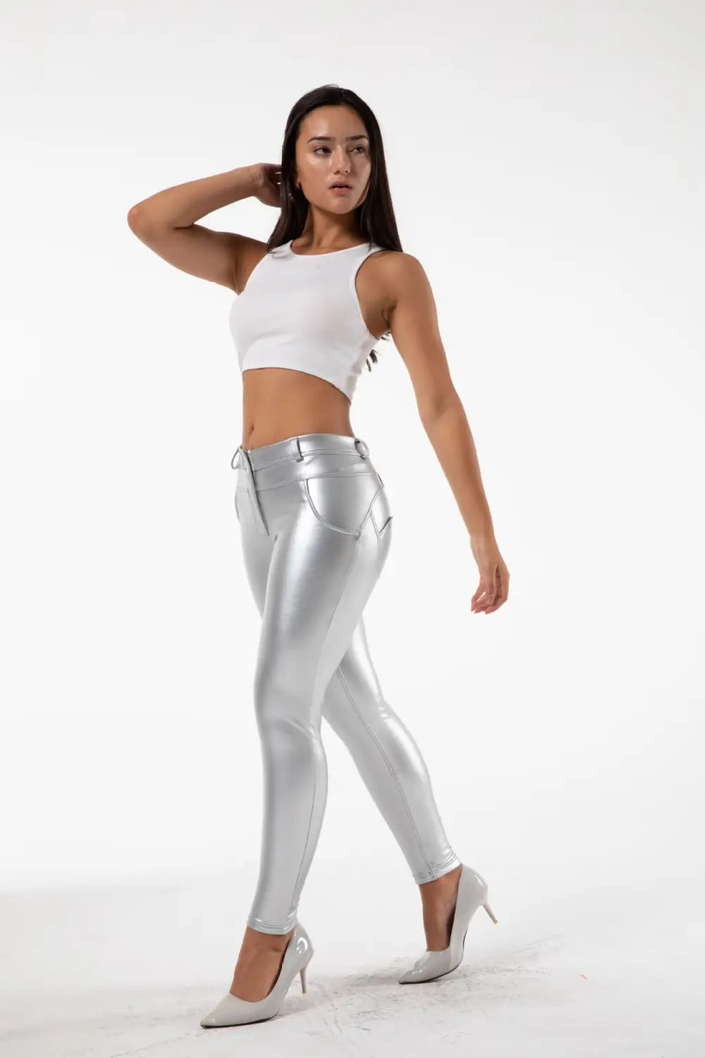 White PU leather high waisted skinny pants featuring shiny silver metallic leggings with a sleek form-fitting design by Royale Essence Lux.