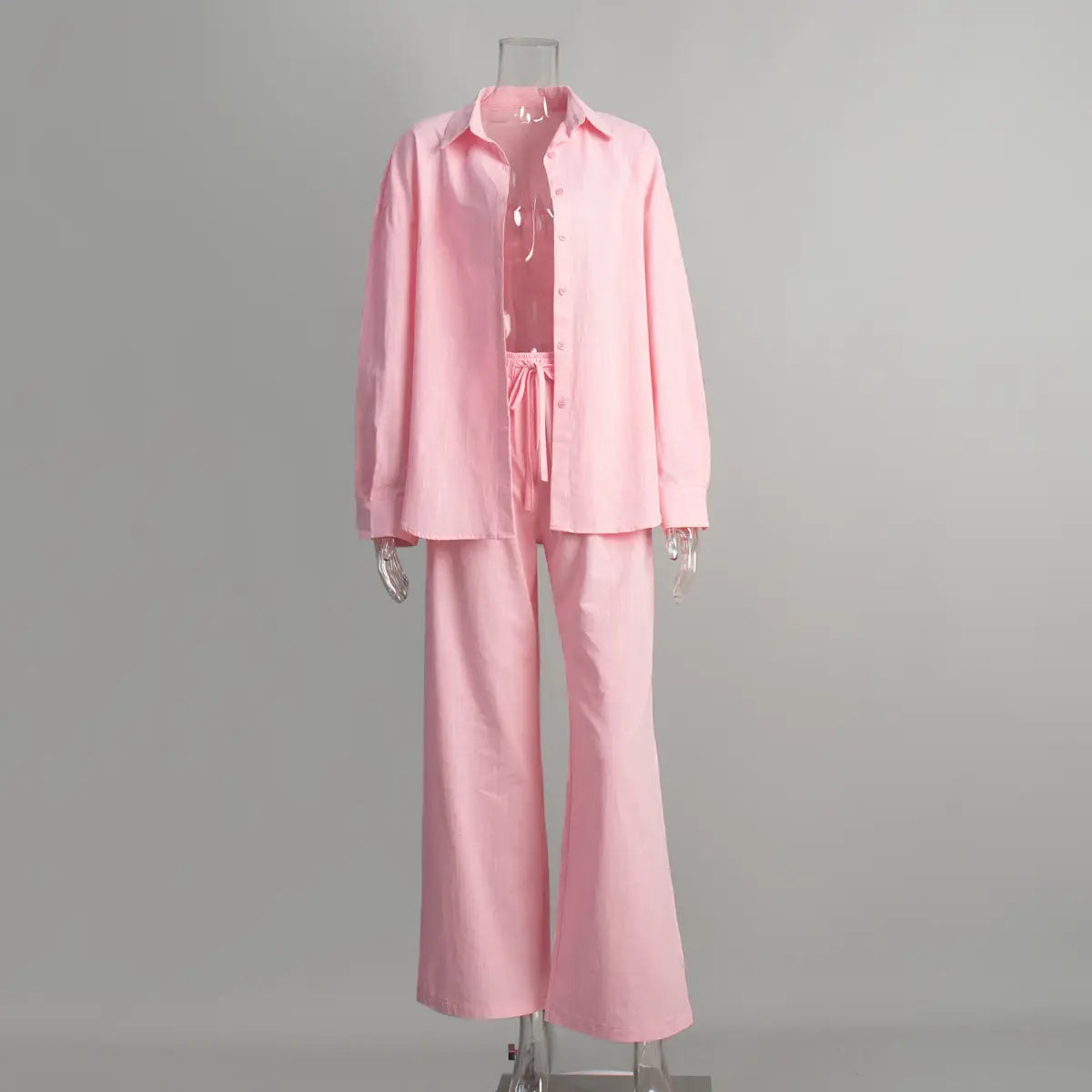 pink linen long sleeve shirt trousers suit featuring a button-up shirt and matching wide-leg pants