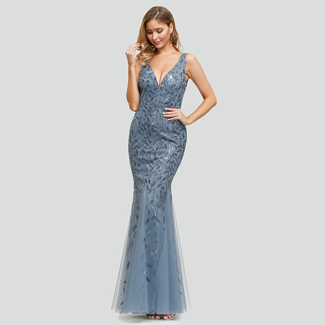 A shimmering blue temperament mermaid dress featuring intricate gold sequined leaf patterns and a sheer tulle overlay.
