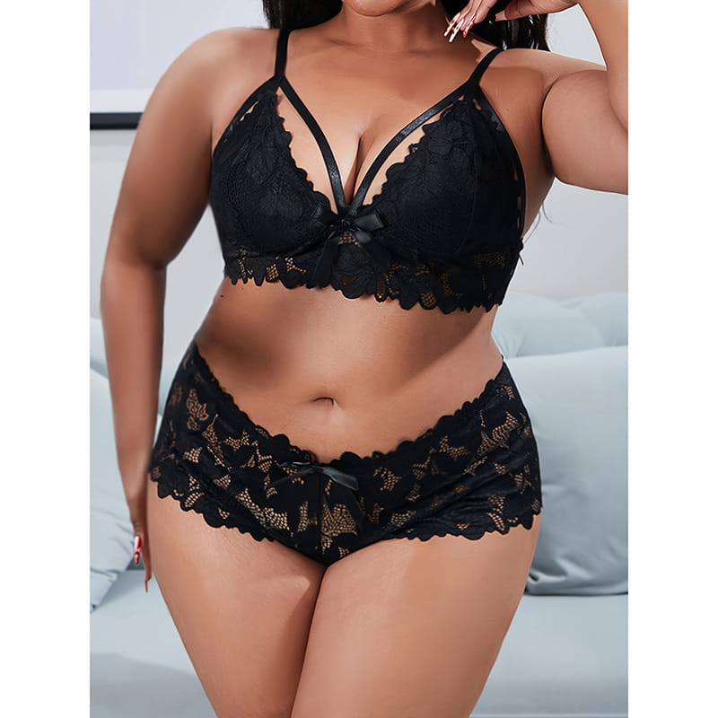 blue plus size underwear mesh suit featuring a black lace lingerie set with delicate floral patterns and a central bow detail on the bra made from mesh and satin ribbon.