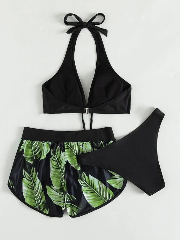 black halter top leaf print bikini set with green tropical leaf print shorts and solid black high-waisted bottom ideal for shorts fashion summer in a 3pcs leaf print design