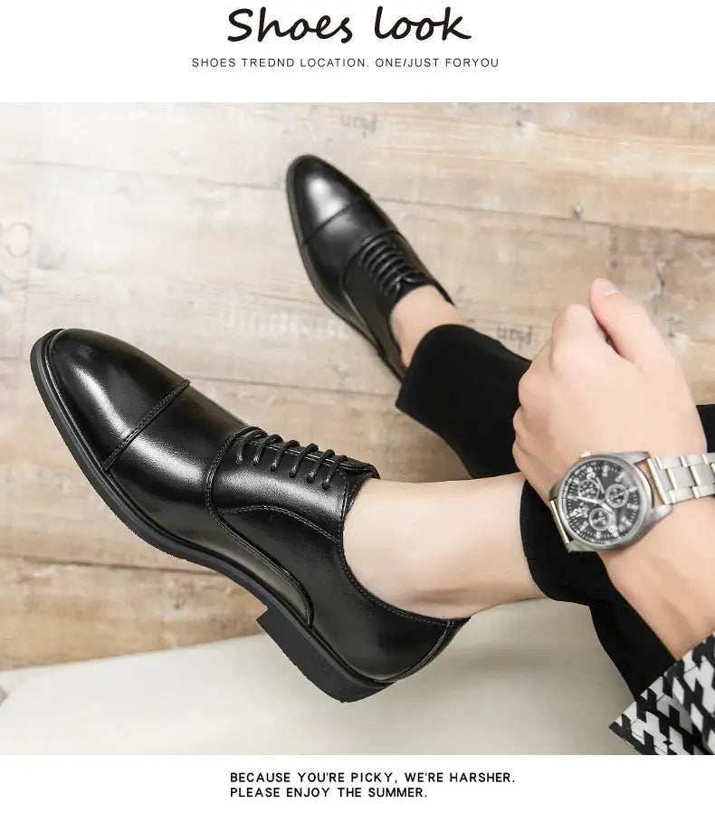 Black leather lace-up oxford shoes with a polished finish and classic cap-toe design for plus size casual leather footwear.