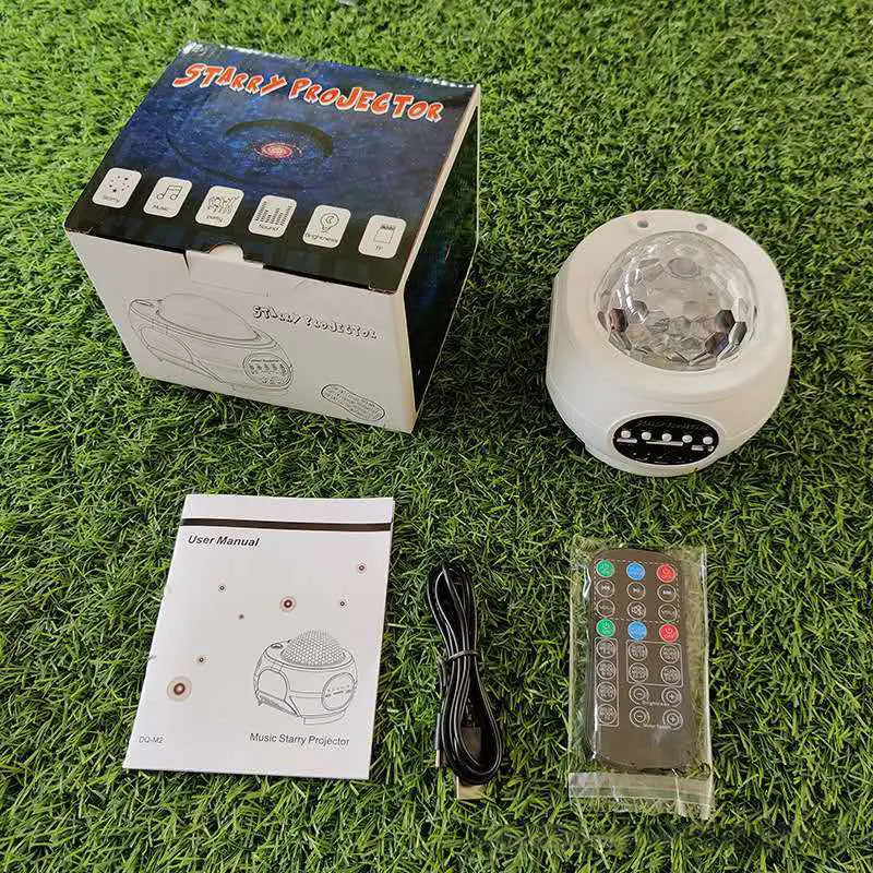 White round music starry projector night light with a clear crystal dome and usb control music buttons on the base for remote control use.