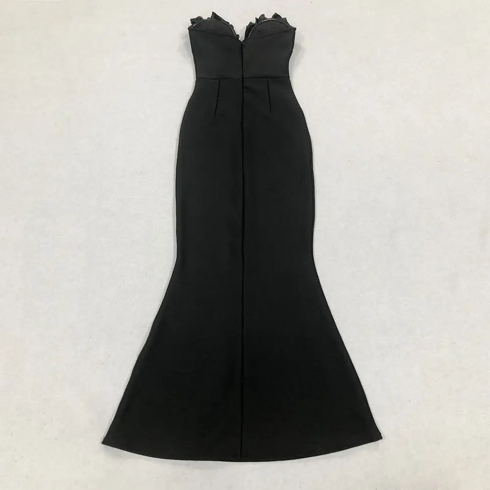 black mermaid-style gown with a fitted bodice and ruffled neckline exemplifies the style temperament socialite for elegant evening occasions.