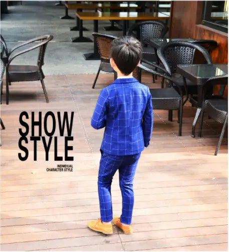 blue plaid children’s three-piece fashion suit with matching pants paired with mustard-colored shoes for a comfortable and stylish comfort suit option