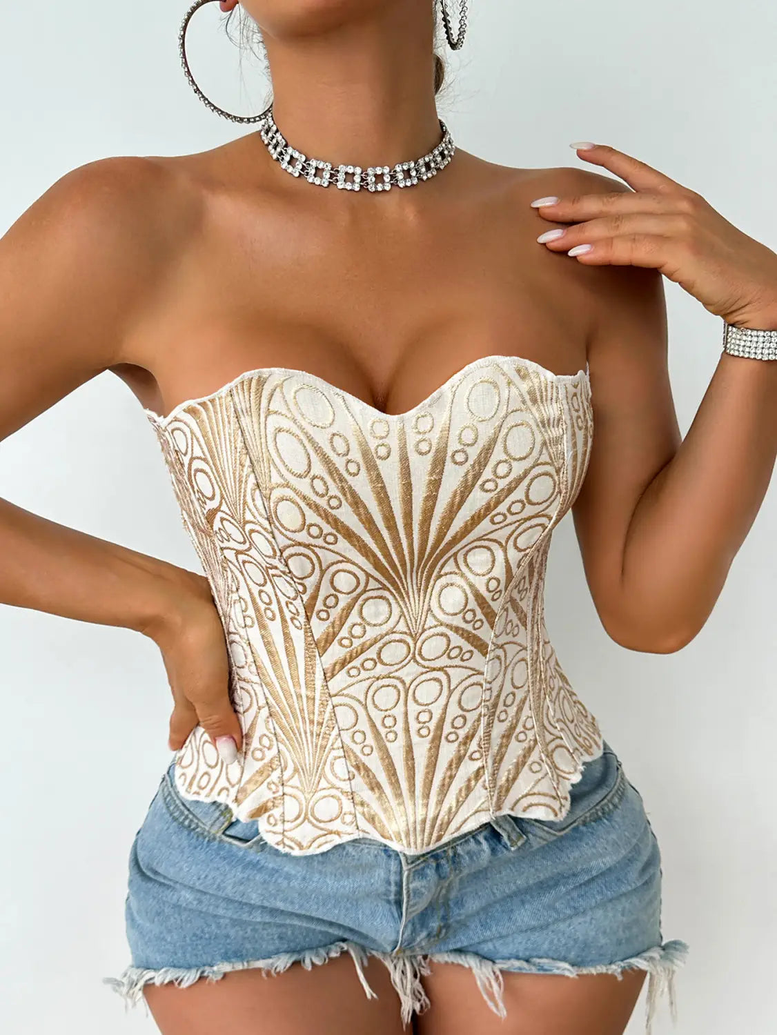 Beige and gold embroidered corset top with a sweetheart neckline designed as white lace hollow out party club corset clothing for streetwear party club look.
