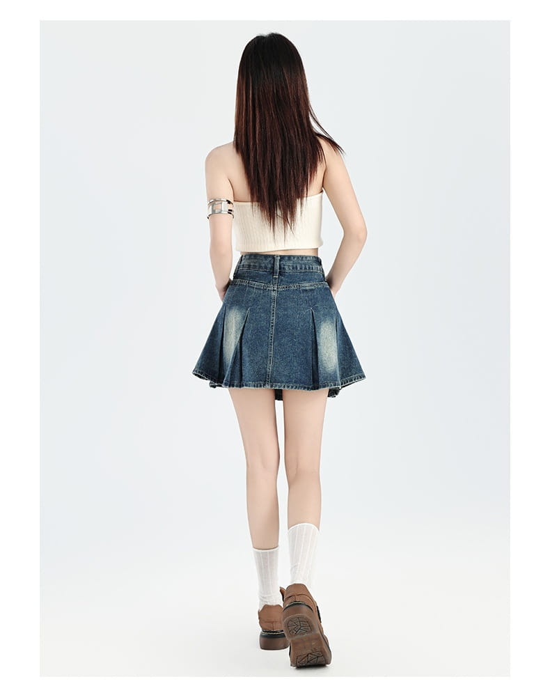 blue denim pleated mini skirt featuring a high waist design as part of a vintage denim skirt cream halter set