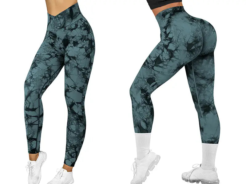 Seamless tie dye high waisted leggings for women in teal and black designed for yoga and athletic wear.