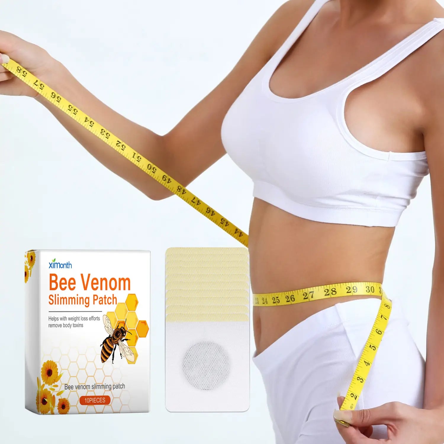 Yellow measuring tape with black numerical markings measuring a woman’s waist demonstrating the use of bee venom lymphatic slimming patch for body tightening and slimming patch benefits.