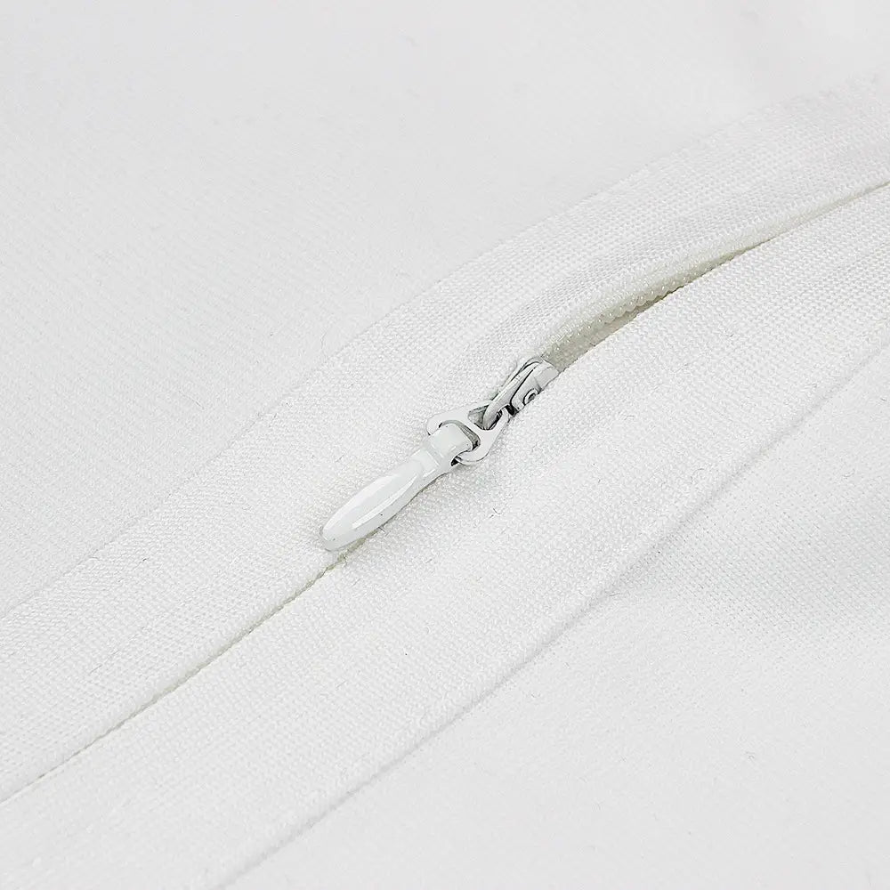 white high neck chest scheming hip short skirt featuring a white fabric zipper with matching pull tab and metallic teeth