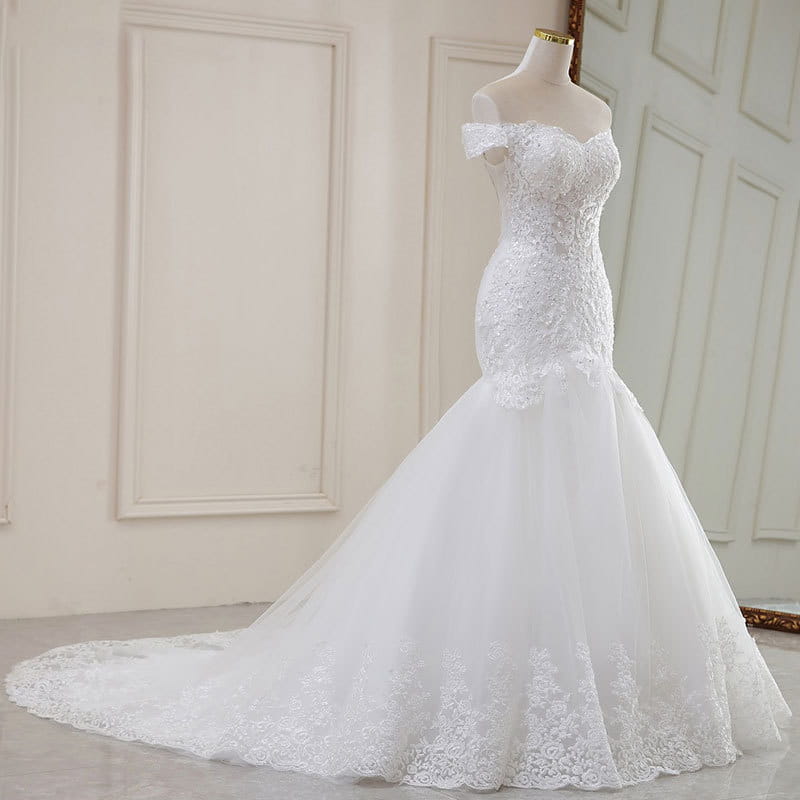 A high waist white lace mermaid wedding dress made of polyvinyl alcohol fiber featuring intricate lace detailing and an off-the-shoulder neckline.