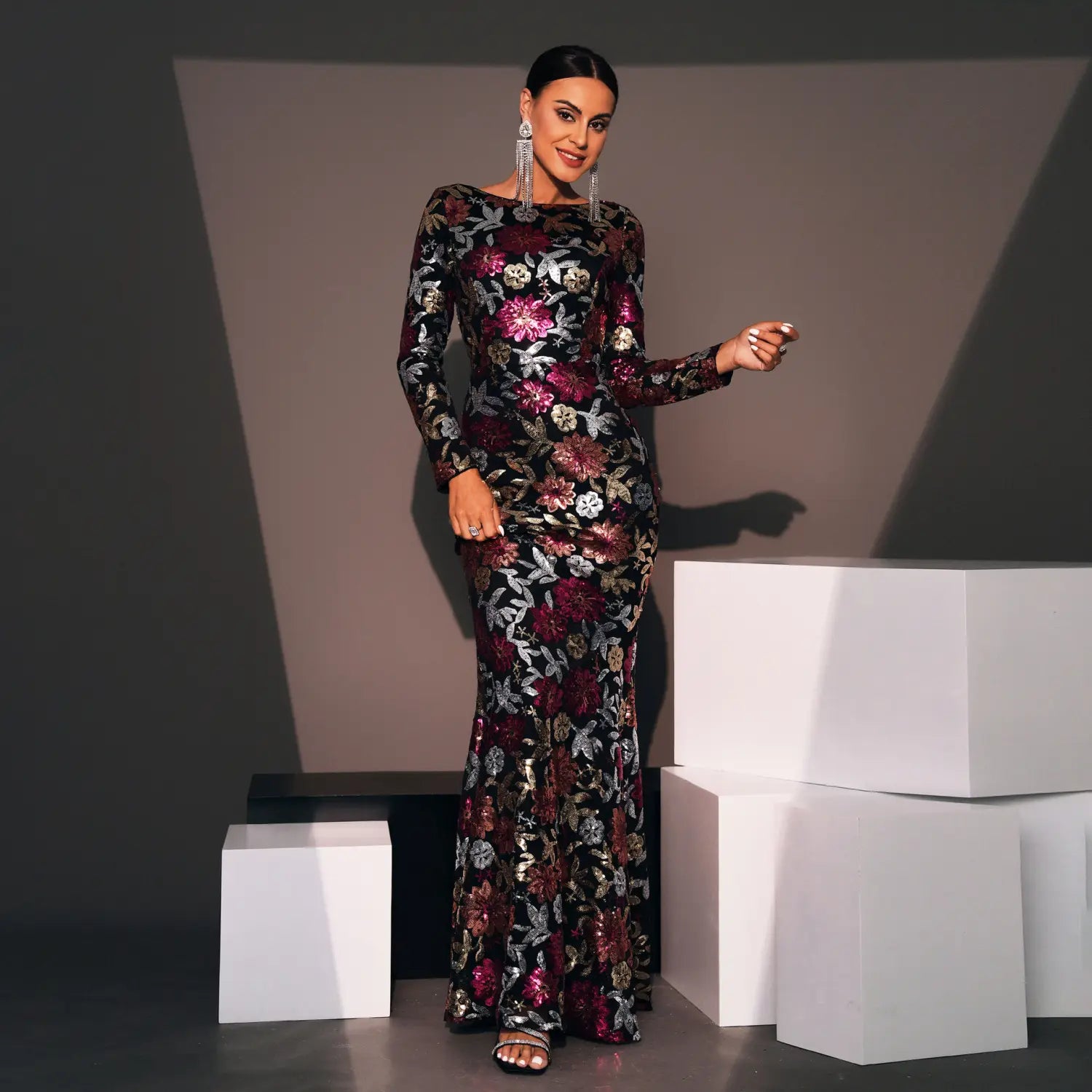 Elegant black evening gown long sleeve adorned with shimmering burgundy and silver floral embroidery perfect for formal occasions