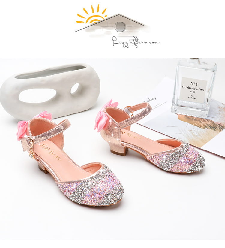 pink and silver glittery girls high heel summer sandals with a bow on the strap and rhinestone sparkling details
