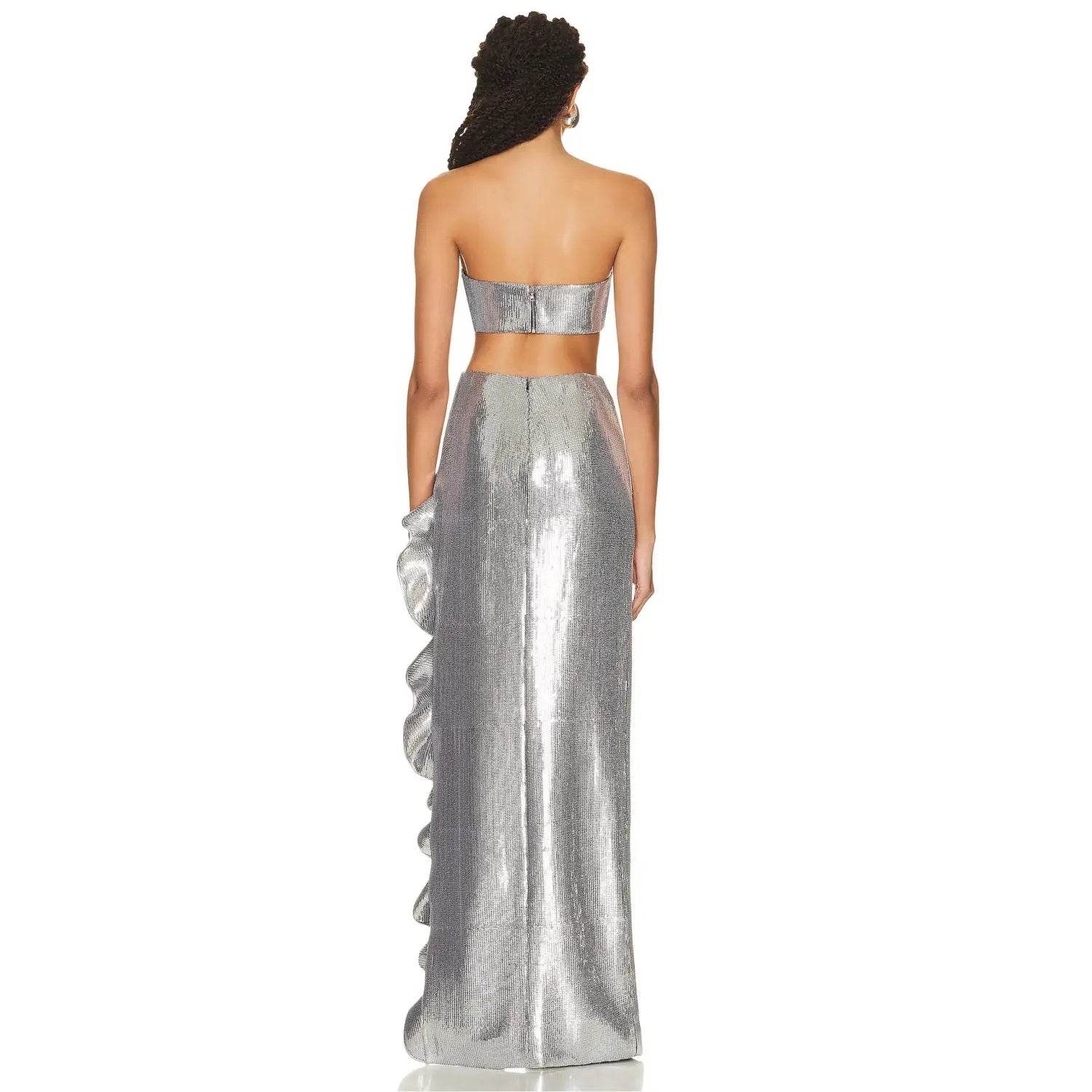 a shimmering silver strapless sequin skirt set featuring a two-piece gown with a sequined top and a flowing skirt with ruffled side detailing