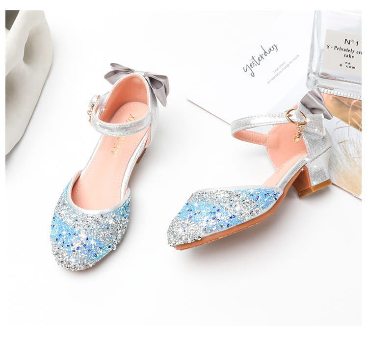 silver and blue glittery girls high heel summer sandals with a bow on the ankle strap featuring rhinestone sparkling details