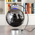8 inch globe magnetic suspension office decoration with a black and silver map encased in clear glass on a metallic base