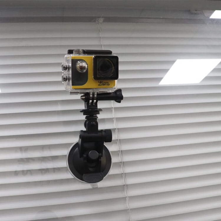 yellow and black gopro hero4 sports camera mounted on an adjustable sports camera suction cup mount designed for secure attachment on smooth surfaces