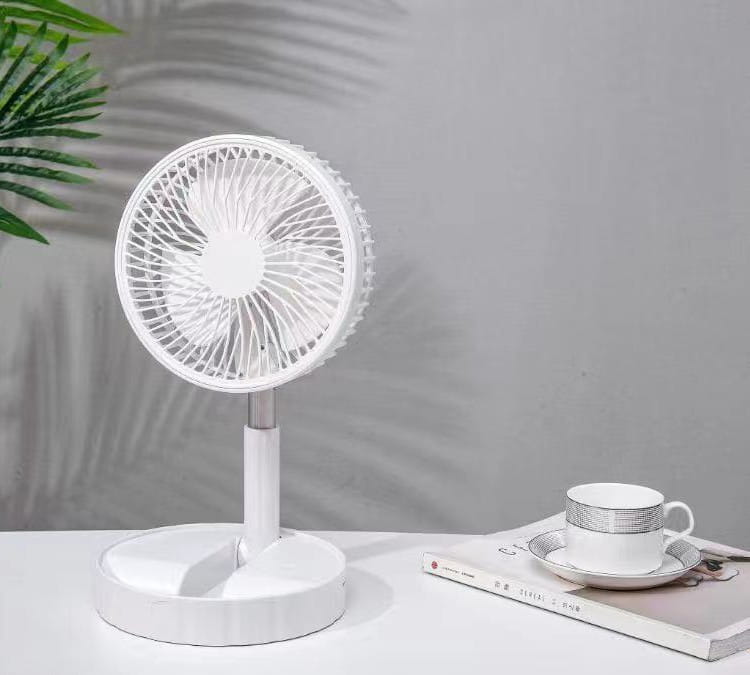 White circular desk fan with a sleek minimalist design and sturdy base for quiet portable telescopic folding use