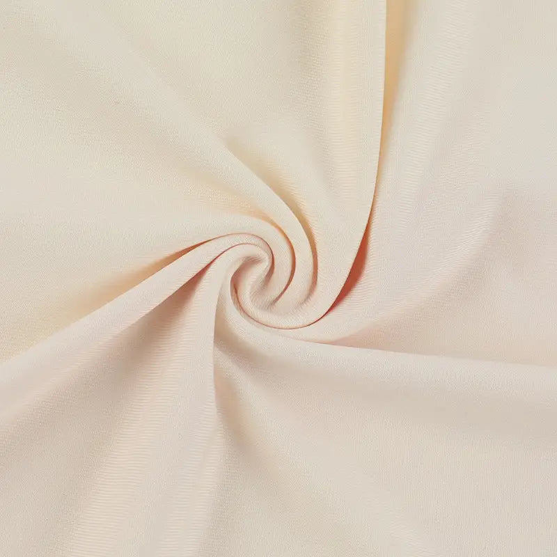 a soft cream-colored stretch fabric with a subtle ribbed texture featured in an elegant slim print floral top and skirt set
