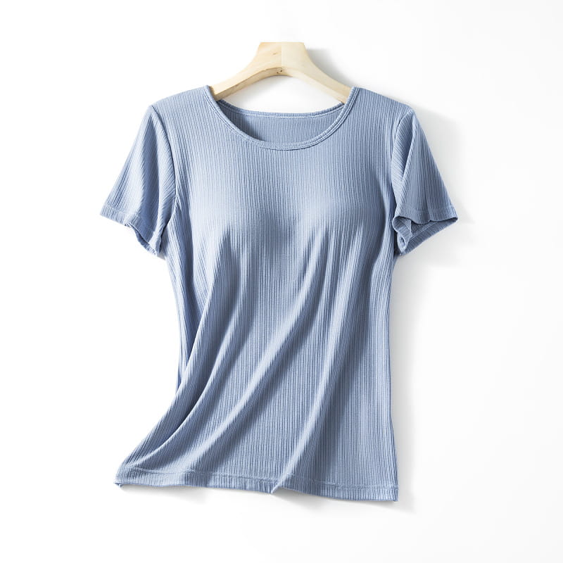 A soft light blue ribbed cotton women’s summerdale loose-fitting padded chest t-shirt with a round neckline and short sleeves.