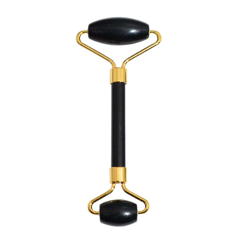 Black obsidian beauty face care massage jade roller featuring black onyx jade with gold-toned metal handles and connectors for face care massage.