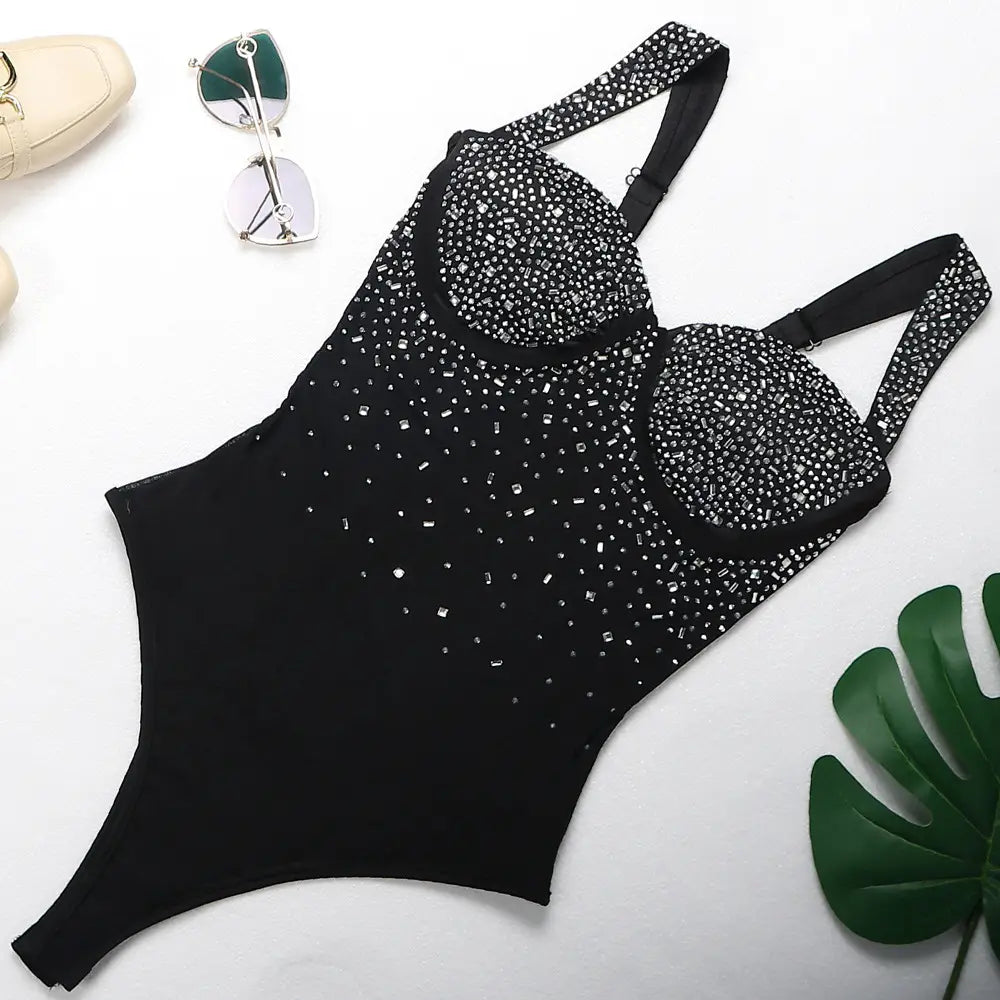black one-piece rhinestone sling swimsuit adorned with sparkling silver rhinestones on the bust and scattered across the torso from the rhinestone sling backless set two colors collection