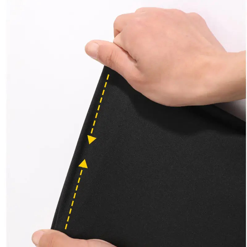 Black flexible gym sport seamless mat with yellow dashed stitching and triangular arrows along the edge for use with slate blue gym sport seamless leggings with pockets.
