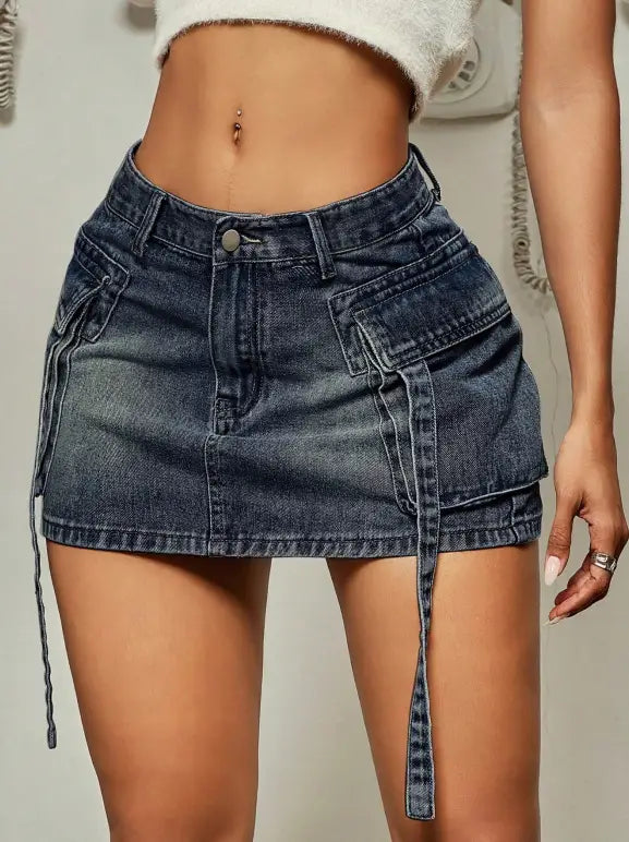dark-wash denim skirt with cargo pockets, matching fabric ties, and a short skirt design.