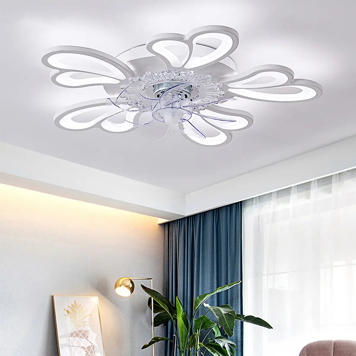 A modern flower crystal large white framed ceiling fan light with a white LED flower-like design featuring translucent petal-shaped arms and crystal accents at the center.