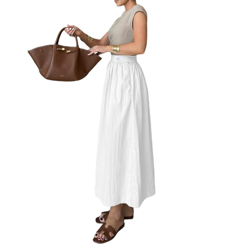 A white cotton linen slimming large hem midi skirt featuring a high waist and subtle pleats.