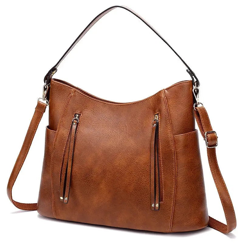 brown faux leather luxury women leather hobo bag with large capacity featuring adjustable shoulder strap and front zippered pockets