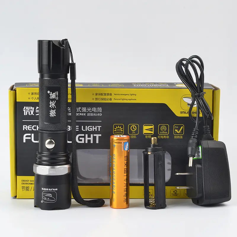 Black rechargeable spiked tactical self-defense led flashlight with textured grip and silver accent ring for enhanced handling and durability.