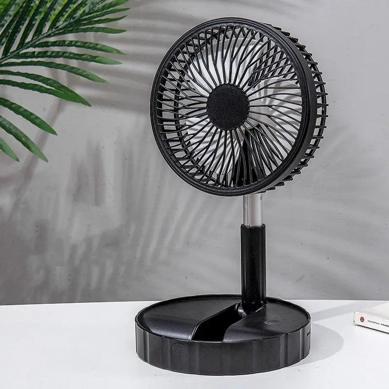 black quiet portable telescopic folding fan with circular grille and adjustable stand for easy positioning on desk