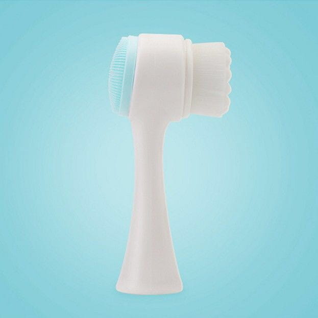 white silicone dual sided cleansing instrument with light blue bristle head and ergonomic handle for beauty skin care face wash and skin care face use