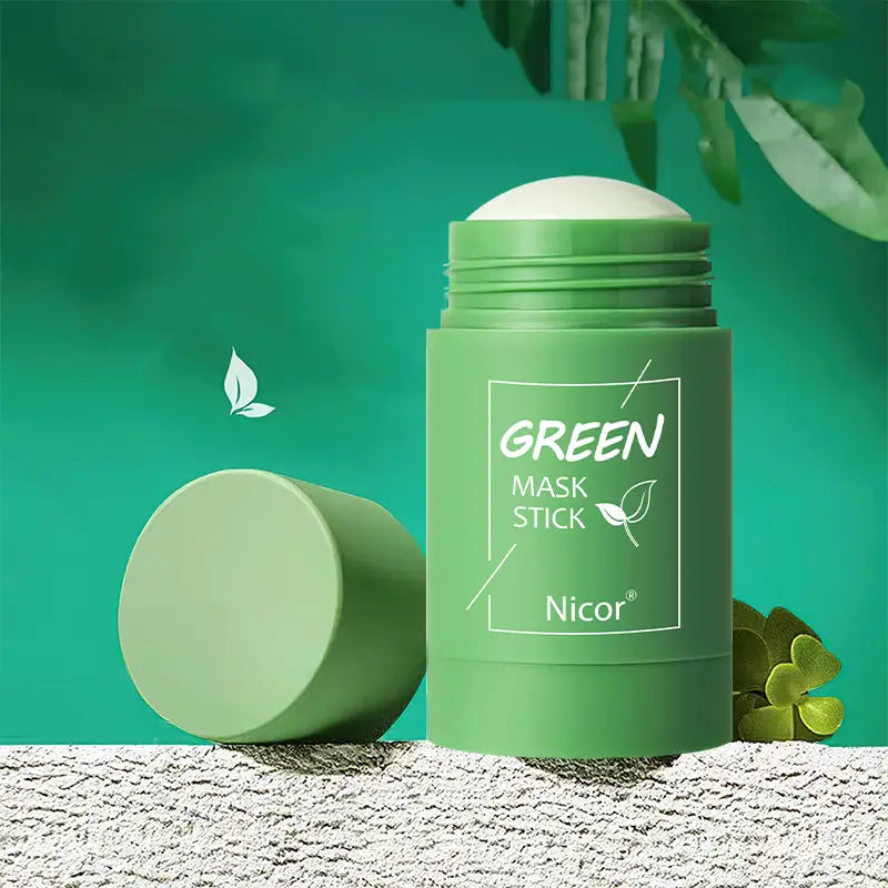 green cylindrical nicor cleansing green tea and eggplant oil control mask stick with a white cap and minimalist label on matte plastic designed for oil control and cleansing green tea benefits
